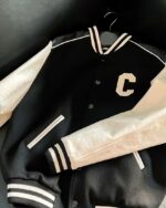 Blouson Teddy femme style veste américaine posé à plat